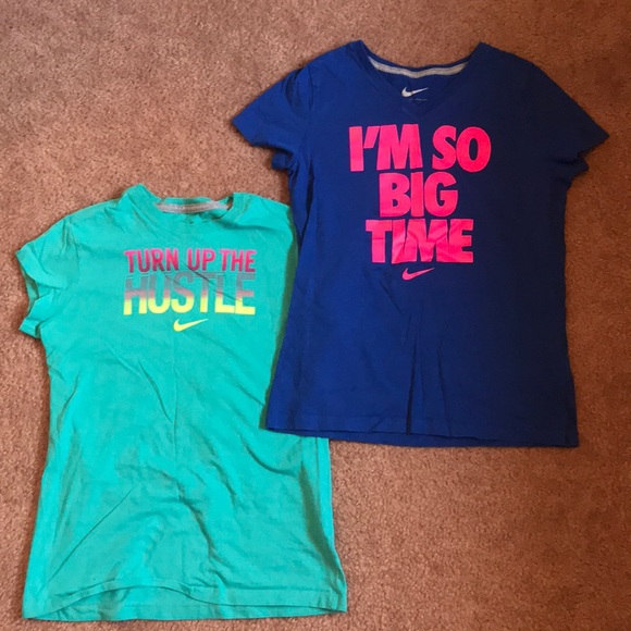 teal and pink nike shirt